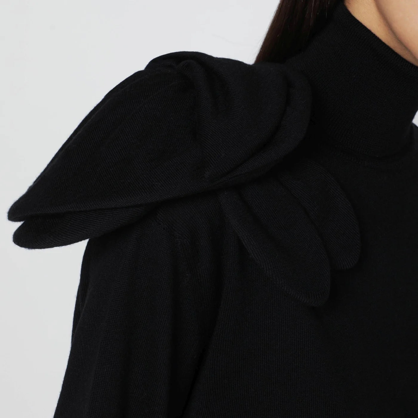 Moschino Black turtleneck sweater with flower detail