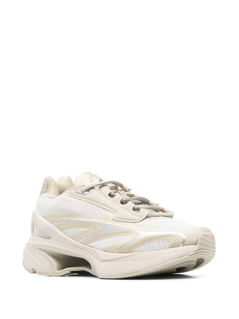 Atlete Adidas nga Stella McCartney në ngjyrë bezhë