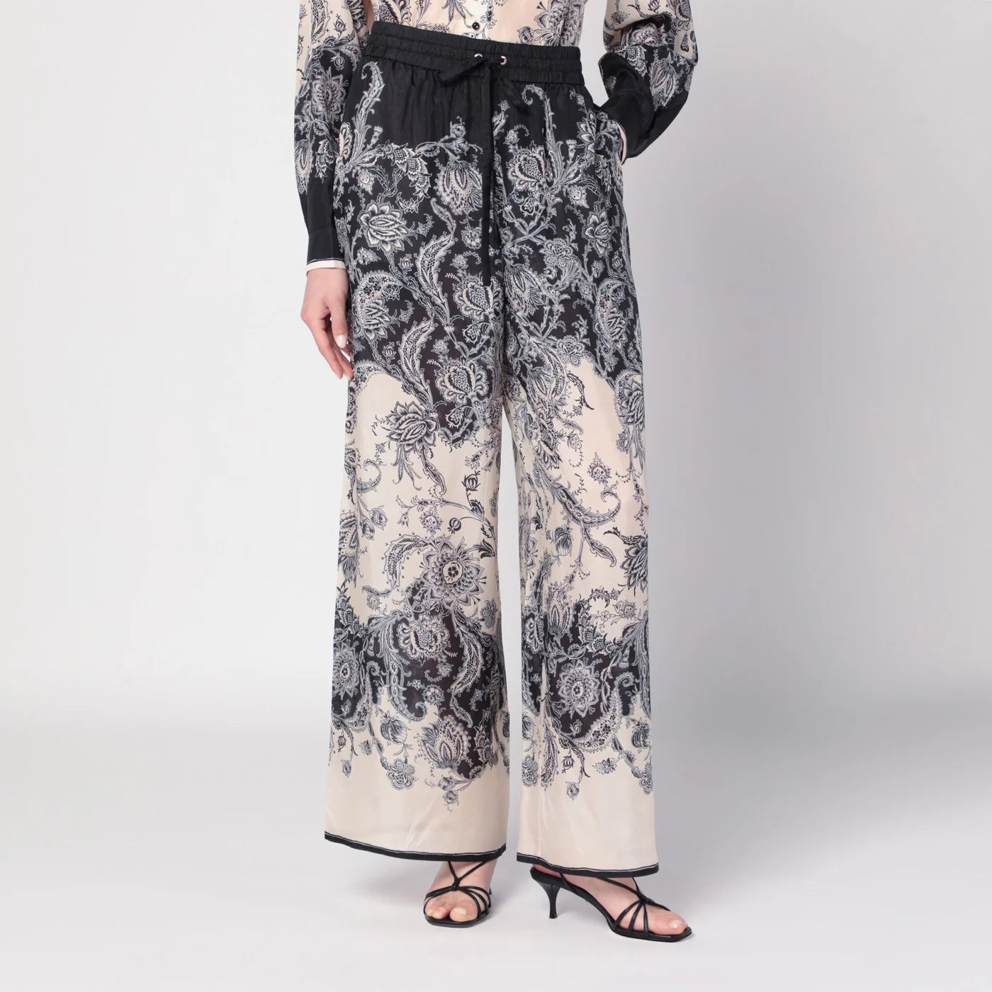 ZIMMERMANN Cream Rhiannon trousers with fantasy print