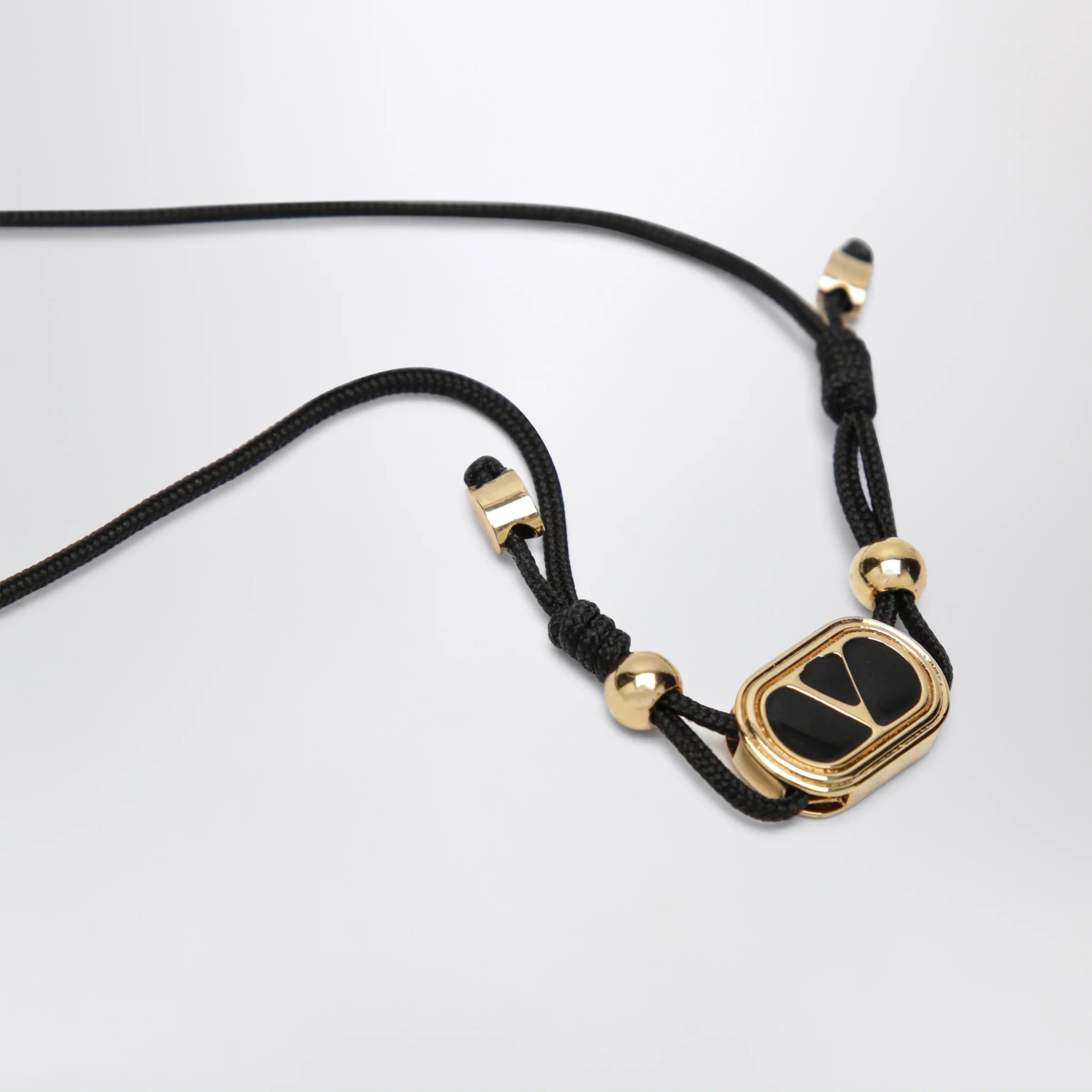 Valentino Garavani Black cord bracelet with enamelled gold V logo