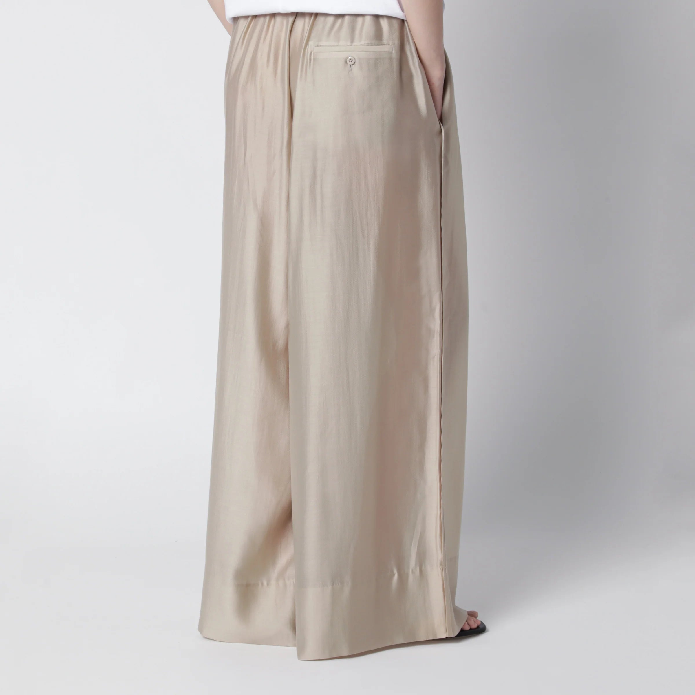 Entire Studios Vento wide-leg trousers in champagne color