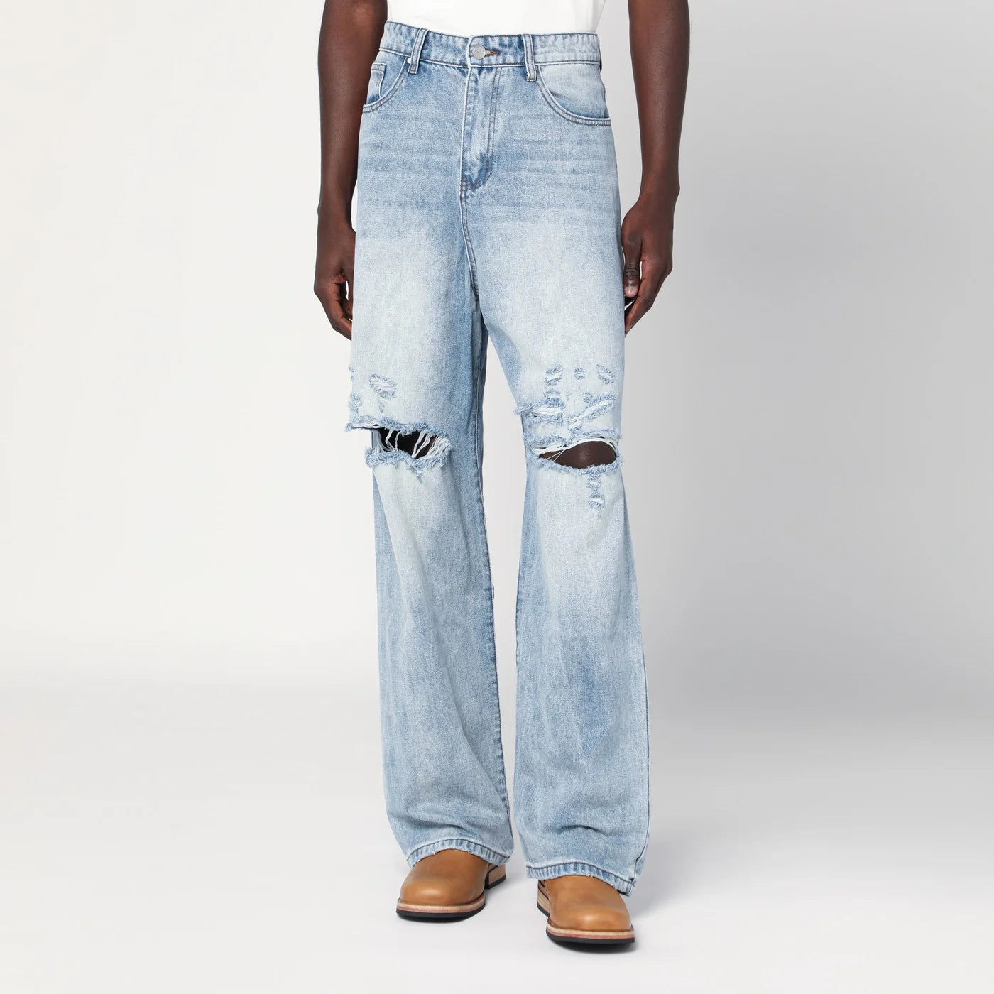 Basketcase Gallery Light blue washed jeans with rips