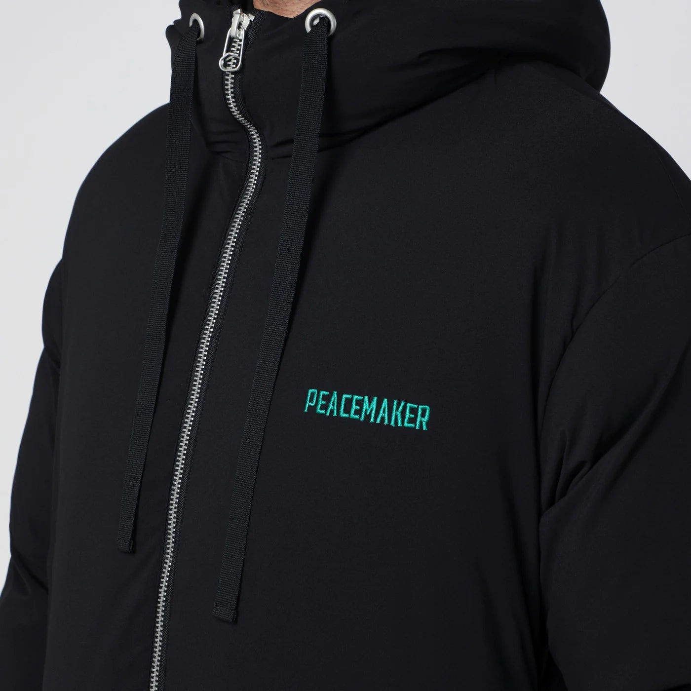 OAMC Black Peacemaker puffer jacket with logo embroidery