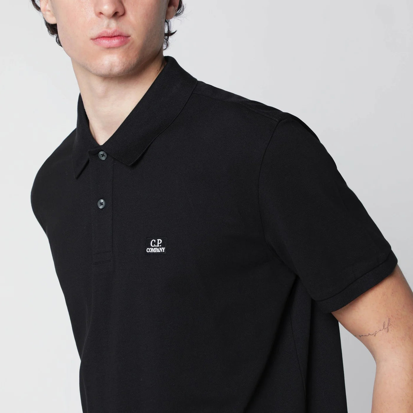 C.P. Company Black polo shirt with logo patch