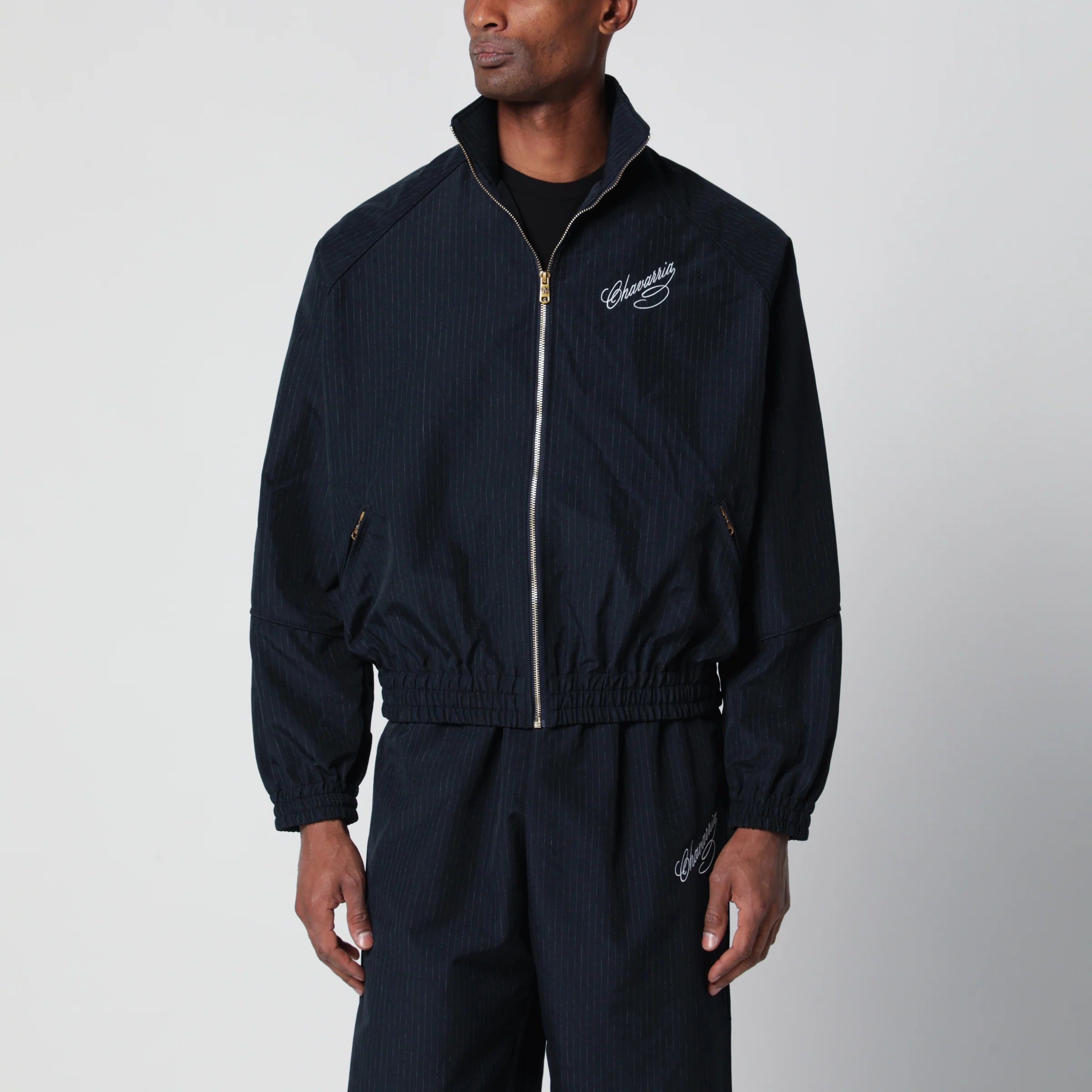 Willy Chavarria Pinstripe zip-up jacket with logo embroidery