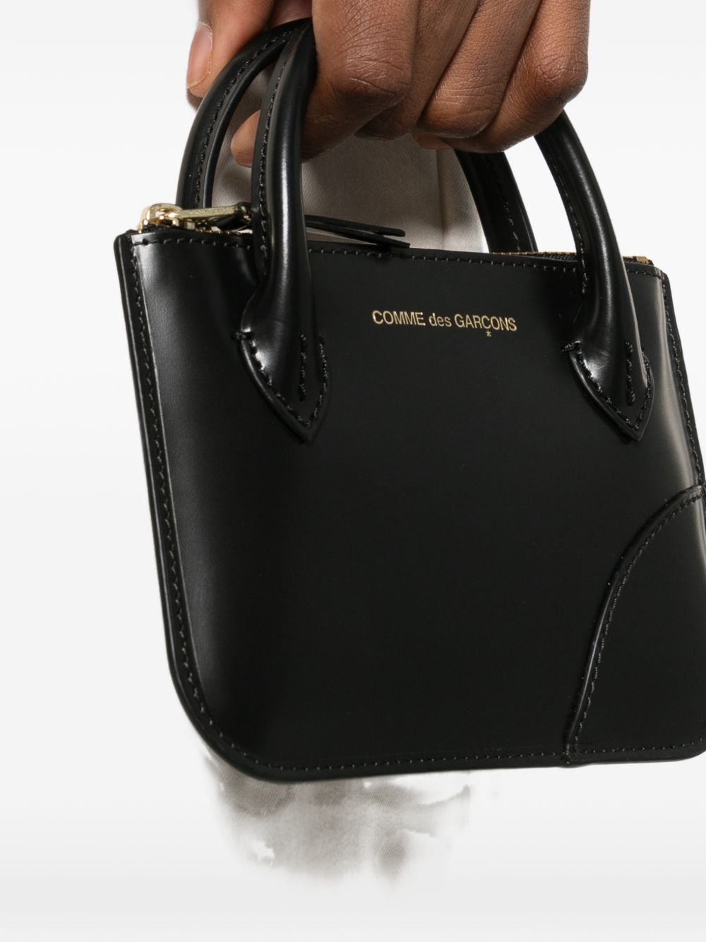 Portofol Comme des Garcons i Zi