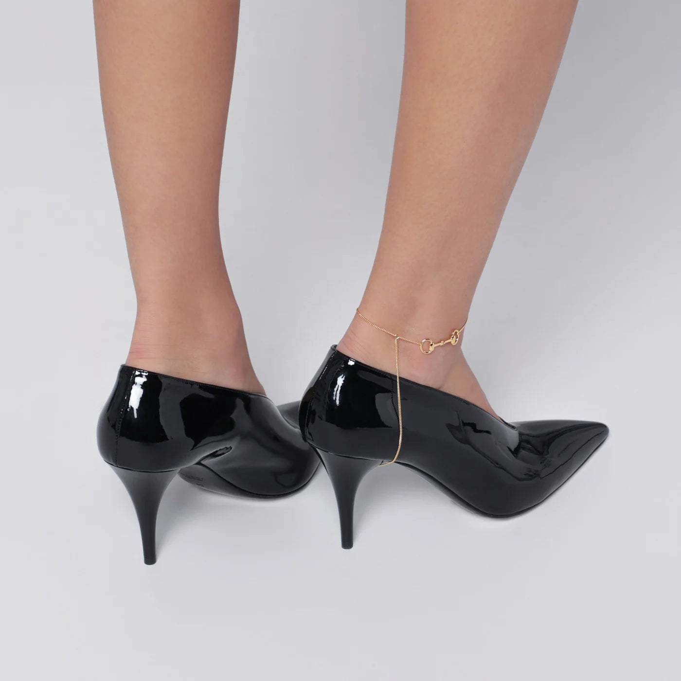 Black Gucci 97 heeled mules
