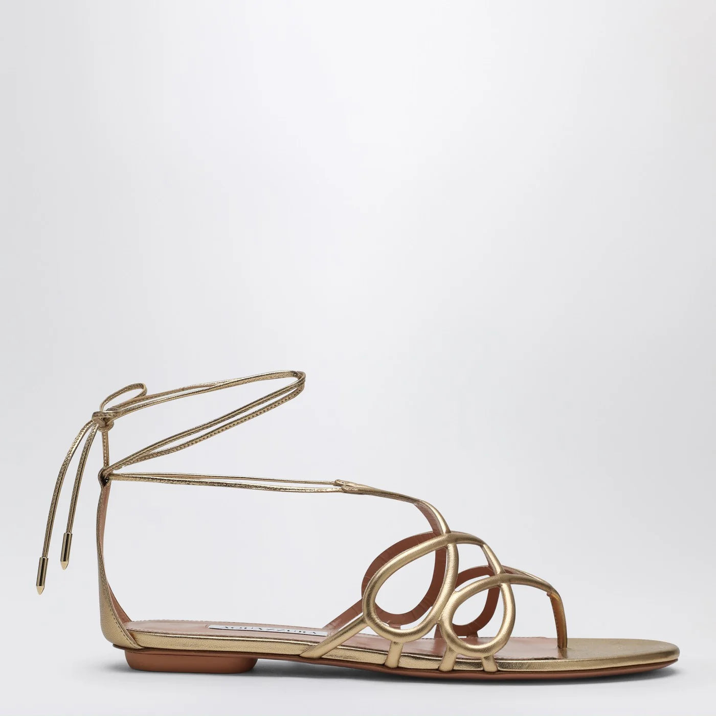 Aquazzura Low gold leather sandal