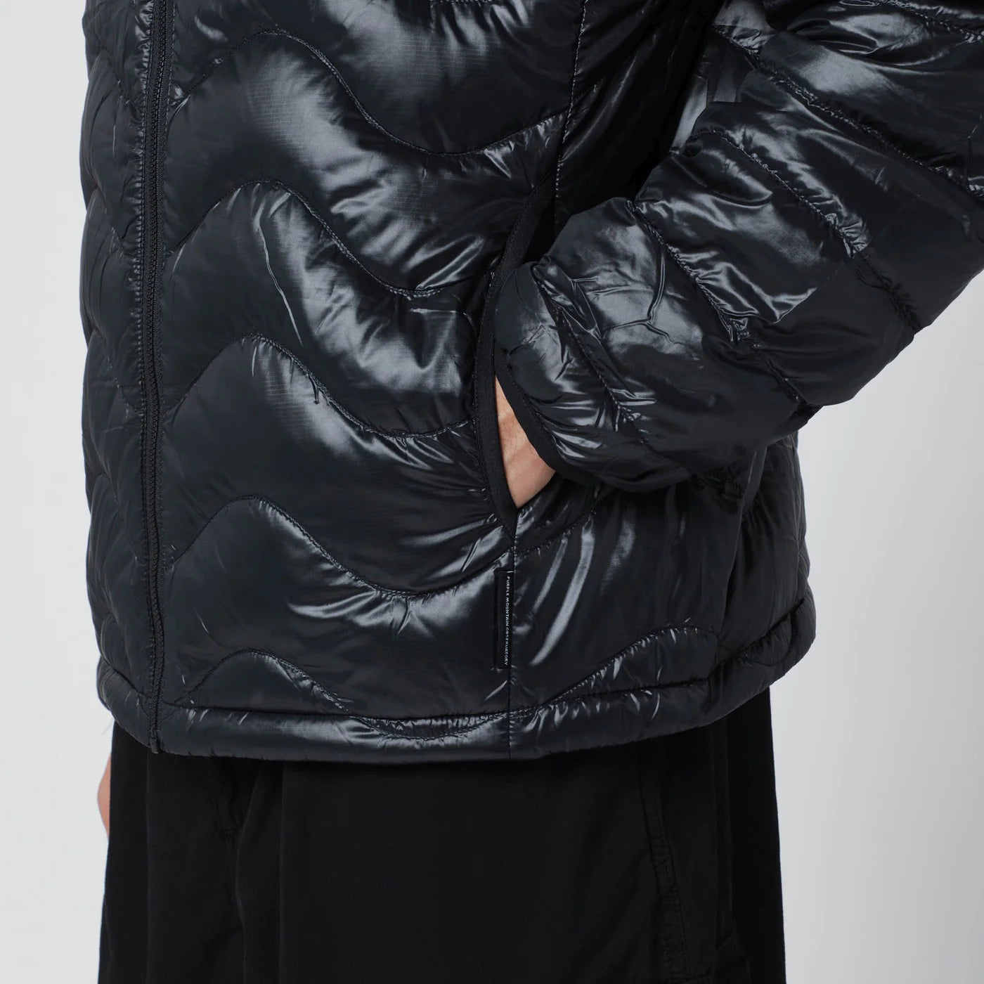 Purple Mountain Observatory Black Waves hooded puffer jacket